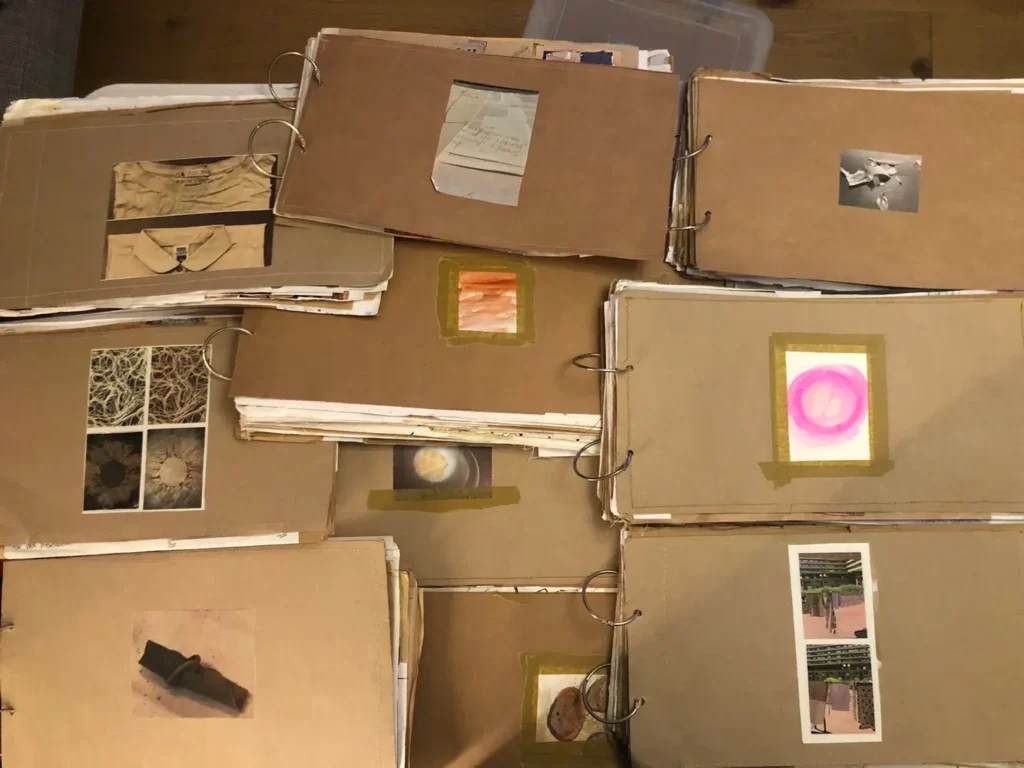 9 paper sketchbooks in brown and cream paper